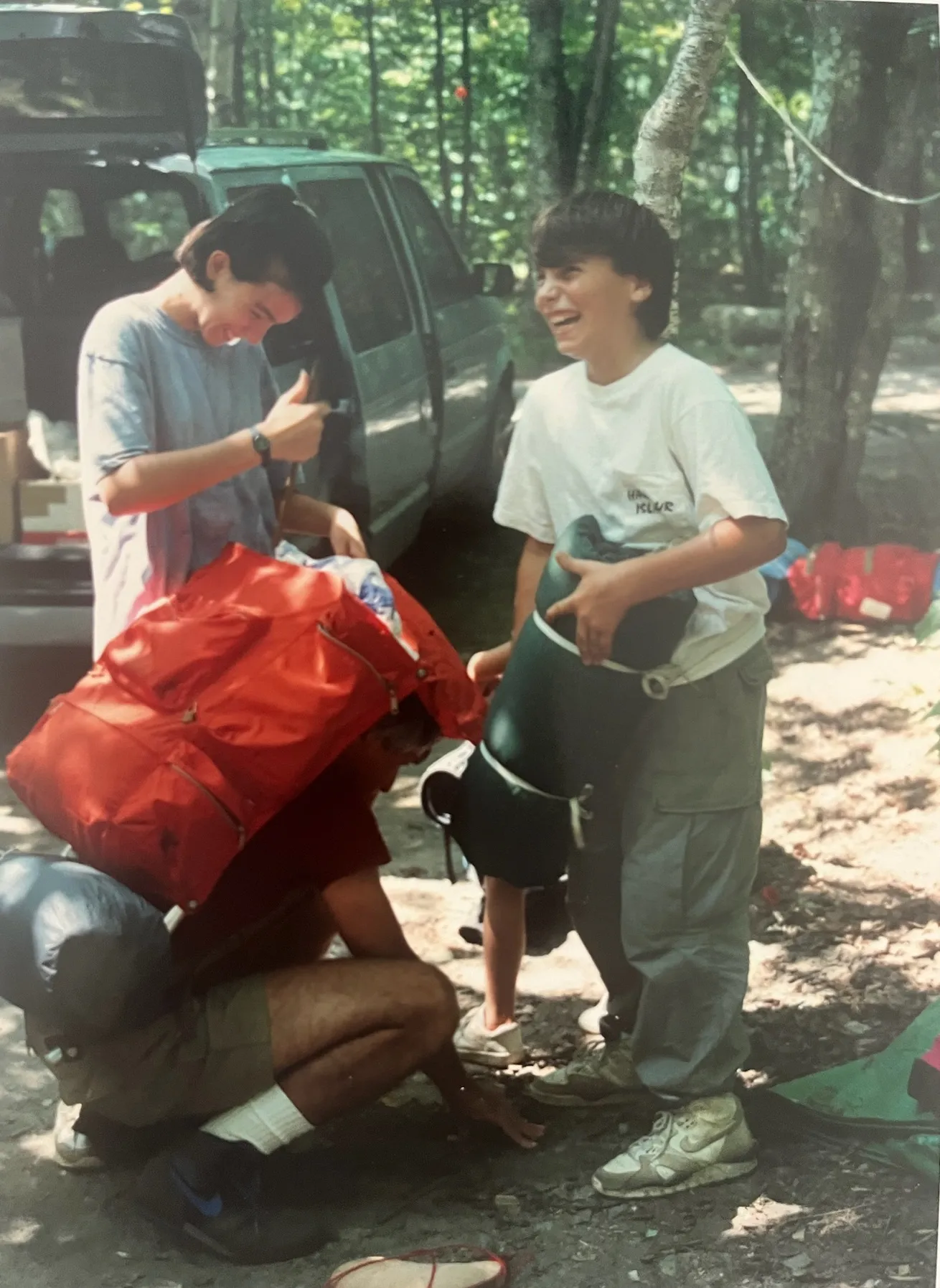 Lynn, Dad and B packing up for a camping trip